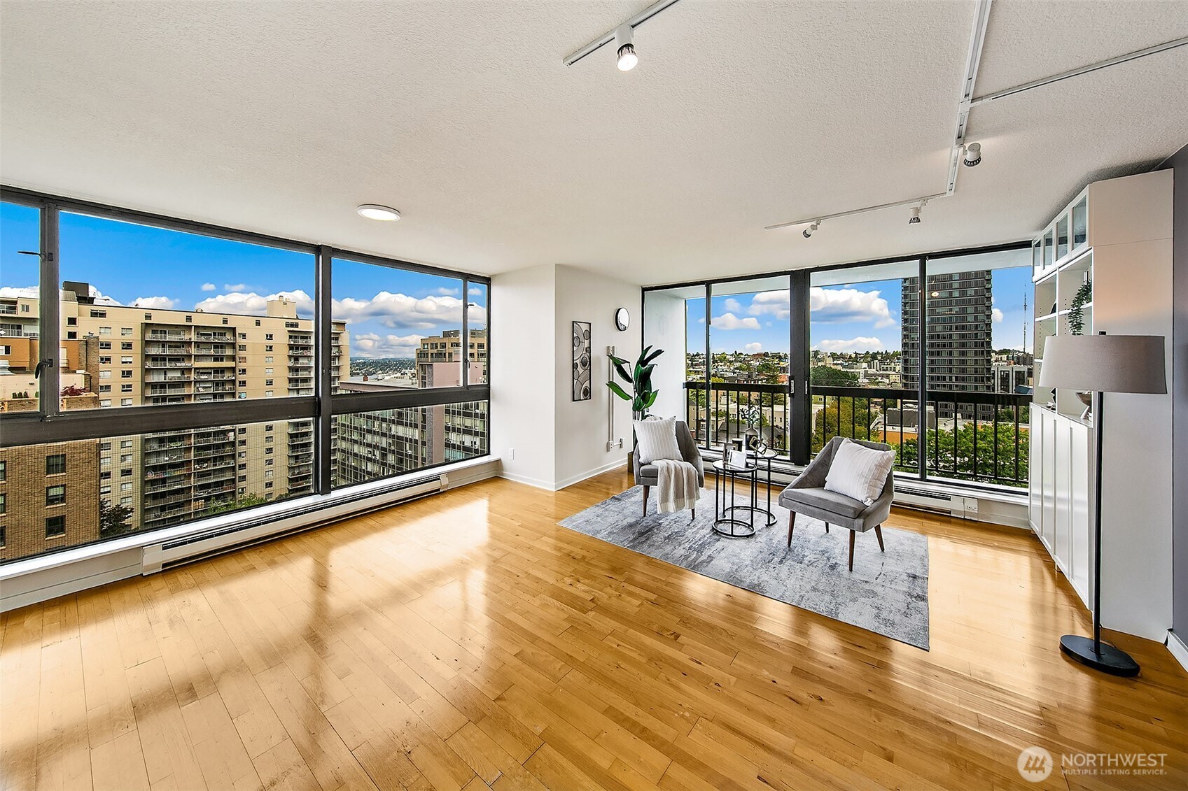 1101 Seneca Street, Unit 1301 Seattle, WA 98101 - Photo 4 of 40 a view of a dining room with furniture window and outside view