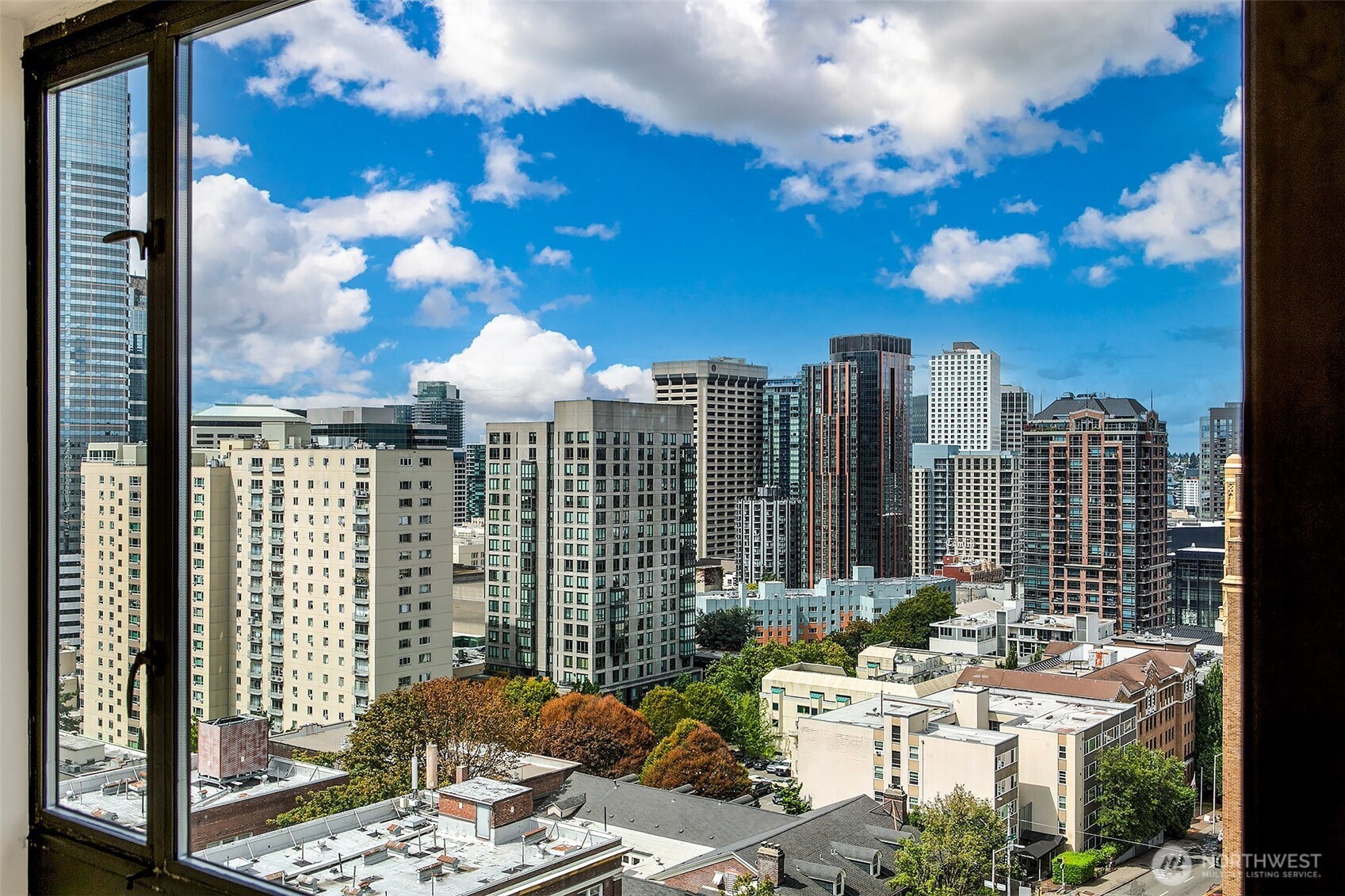 1101 Seneca Street, Unit 1301 Seattle, WA 98101 - Photo 8 of 40 a view of a city with tall buildings