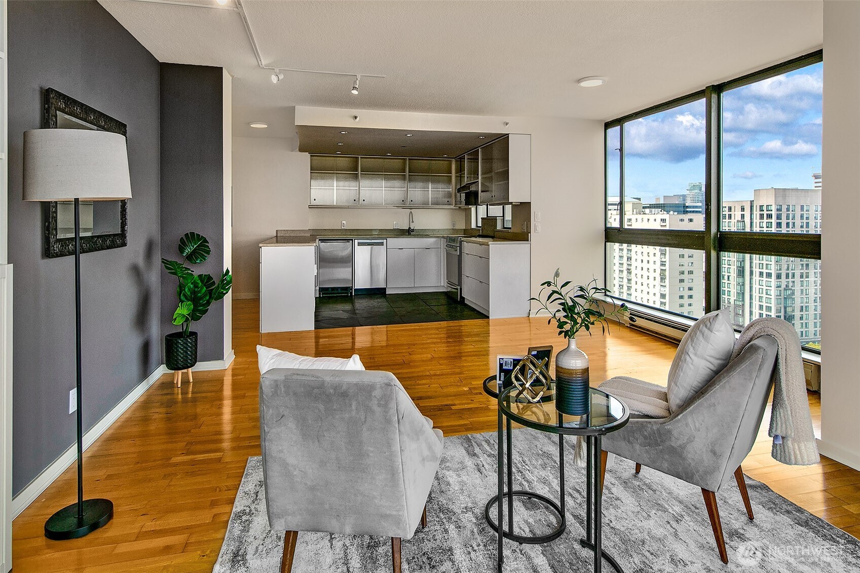 1101 Seneca Street, Unit 1301 Seattle, WA 98101 - Photo 9 of 40 a view of a dining room with furniture and a table