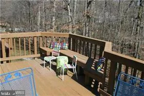 a kitchen with a stove a sink and a refrigerator