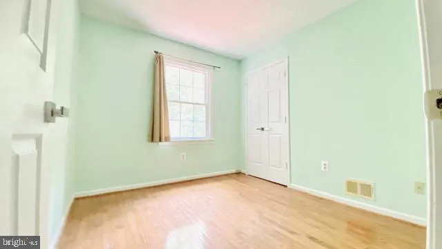 a view of a kitchen sink and a window
