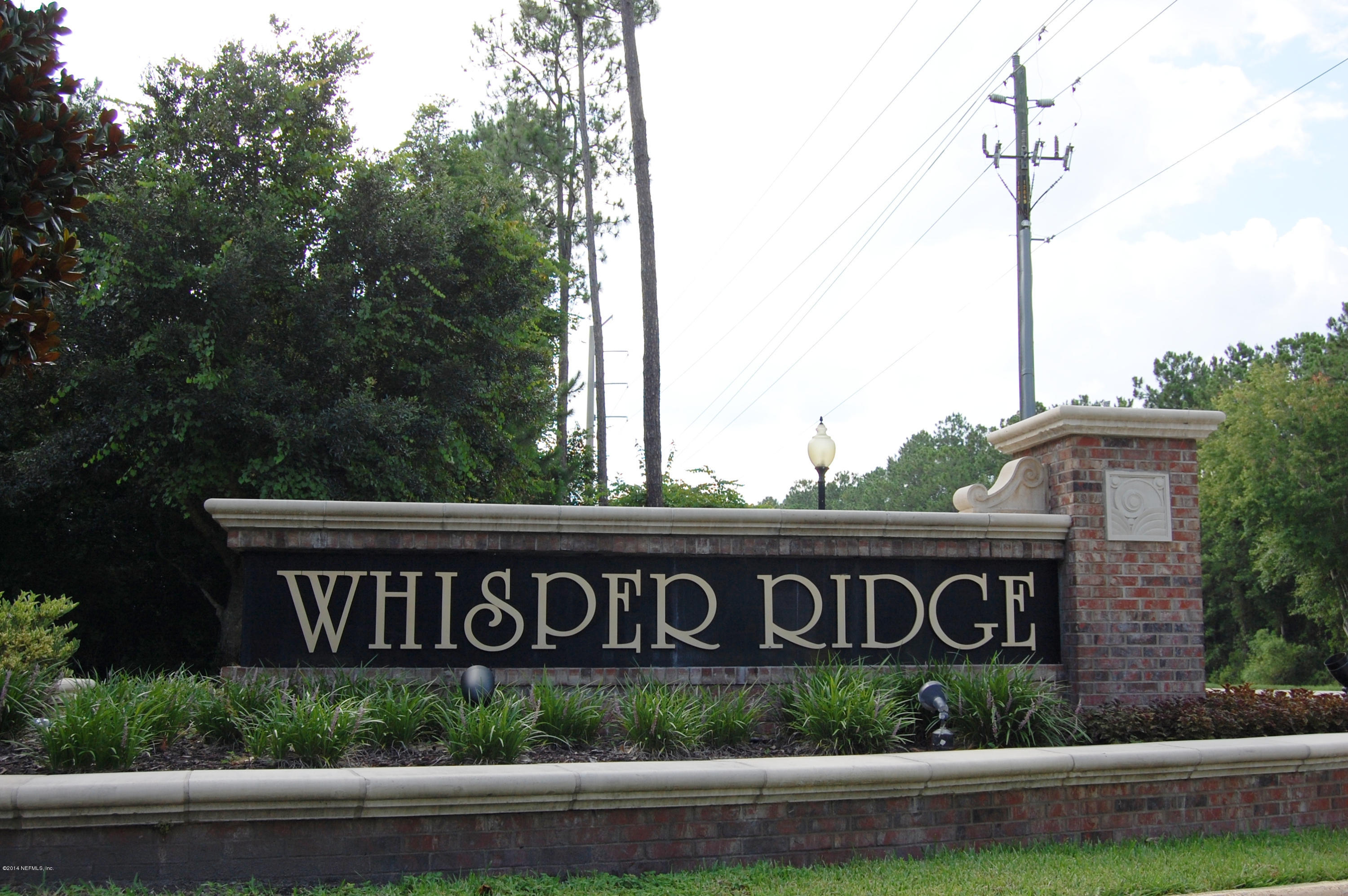 404 Spring Ridge Court St. Augustine, FL 32092 - Photo 2 of 31 a street sign that is on a pole