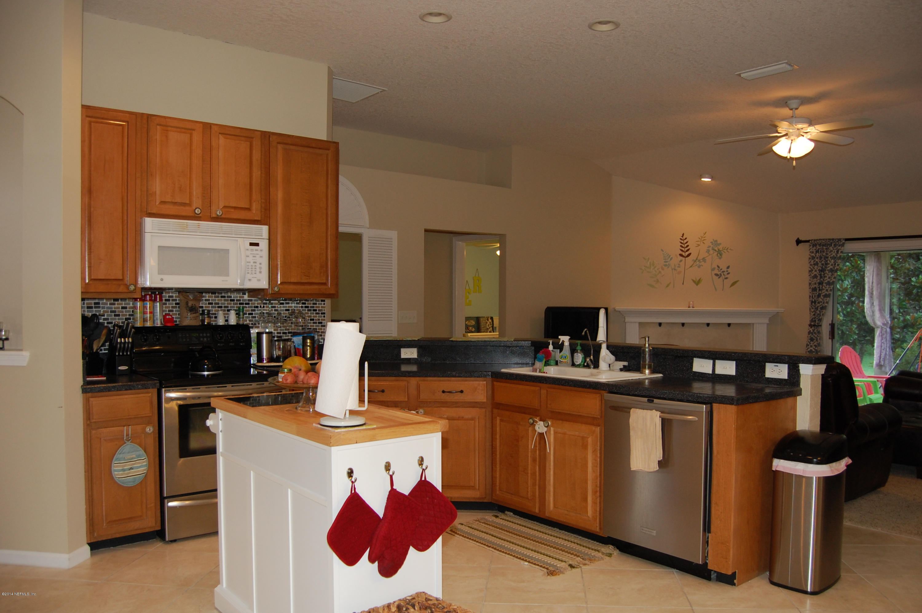 404 Spring Ridge Court St. Augustine, FL 32092 - Photo 10 of 31 a kitchen with lots of counter space and appliances