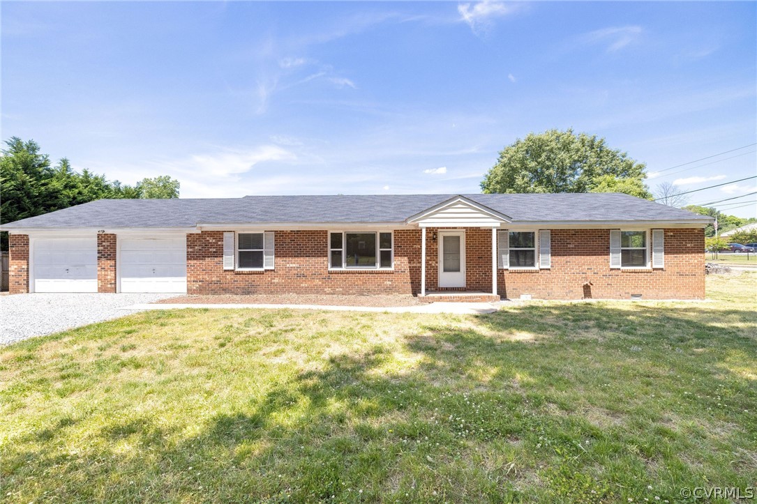 4300 Milsmith Road Chester, VA 23831 - Photo 1 of 27 front view of a house with a patio