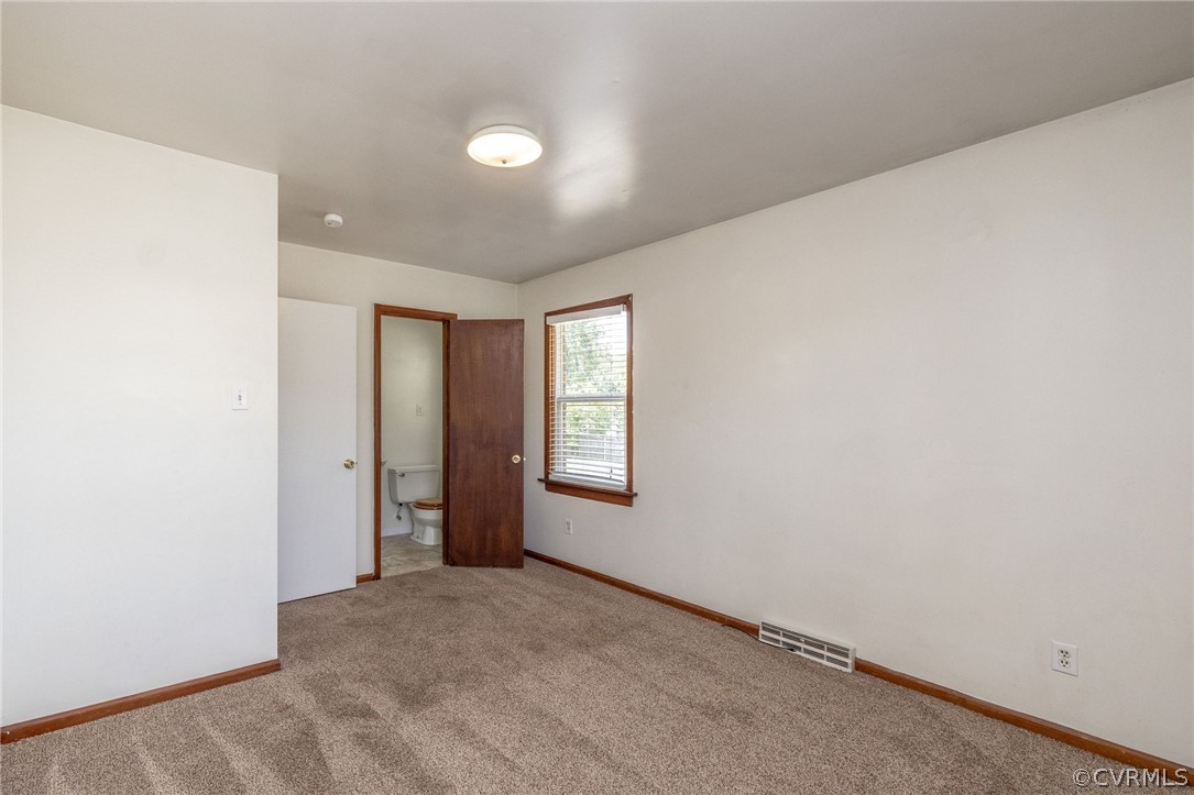 4300 Milsmith Road Chester, VA 23831 - Photo 14 of 27 a view of an empty room with window
