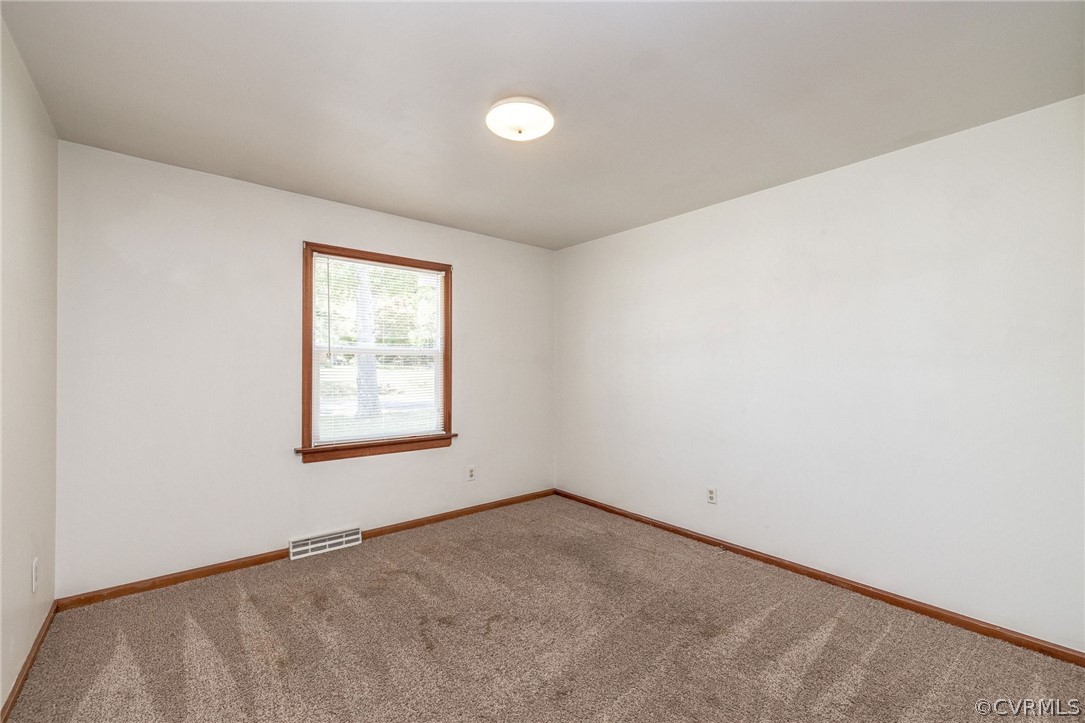 4300 Milsmith Road Chester, VA 23831 - Photo 17 of 27 an empty room with a window