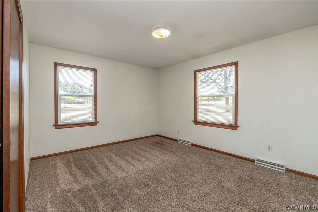 4300 Milsmith Road Chester, VA 23831 - Photo 21 of 27 an empty room with windows