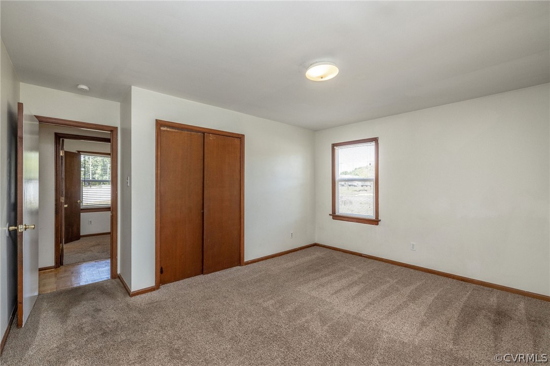 4300 Milsmith Road Chester, VA 23831 - Photo 22 of 27 an empty room with windows and closet