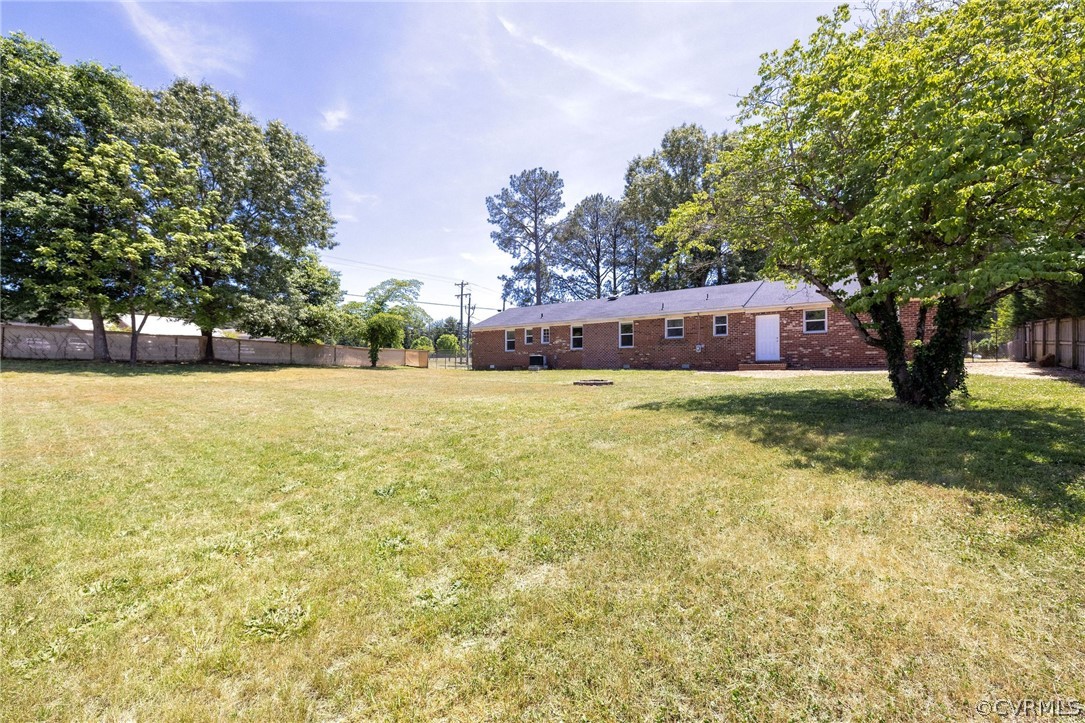 4300 Milsmith Road Chester, VA 23831 - Photo 24 of 27 a view of a large pool with an outdoor space and seating area
