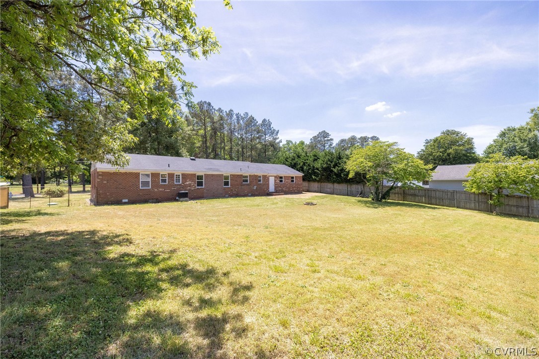 4300 Milsmith Road Chester, VA 23831 - Photo 25 of 27 a view of a swimming pool with an outdoor seating and a yard