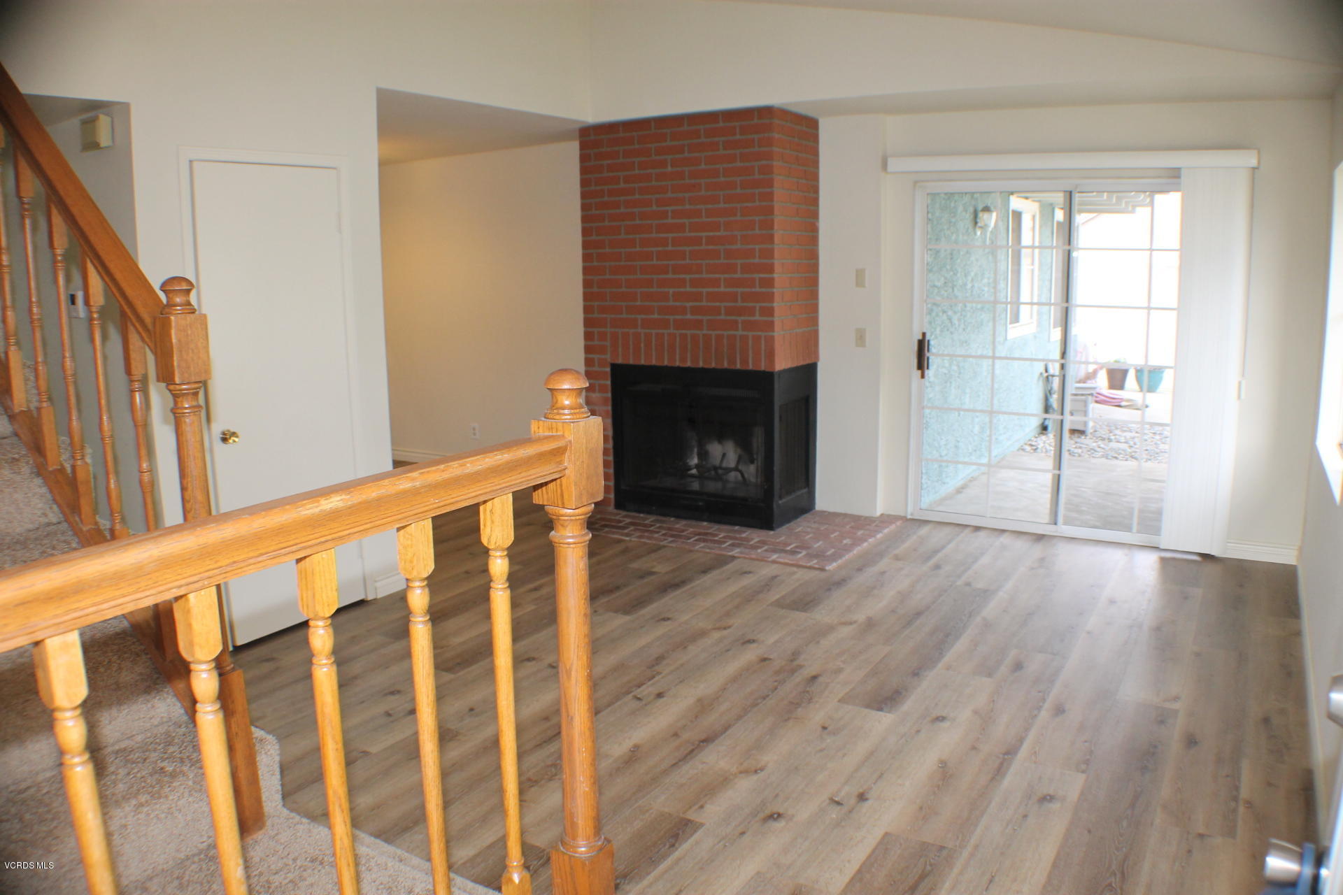 1878 Rory Lane, Unit 2 Simi Valley, CA 93063 - Photo 2 of 30 a view of wooden floor and a fireplace