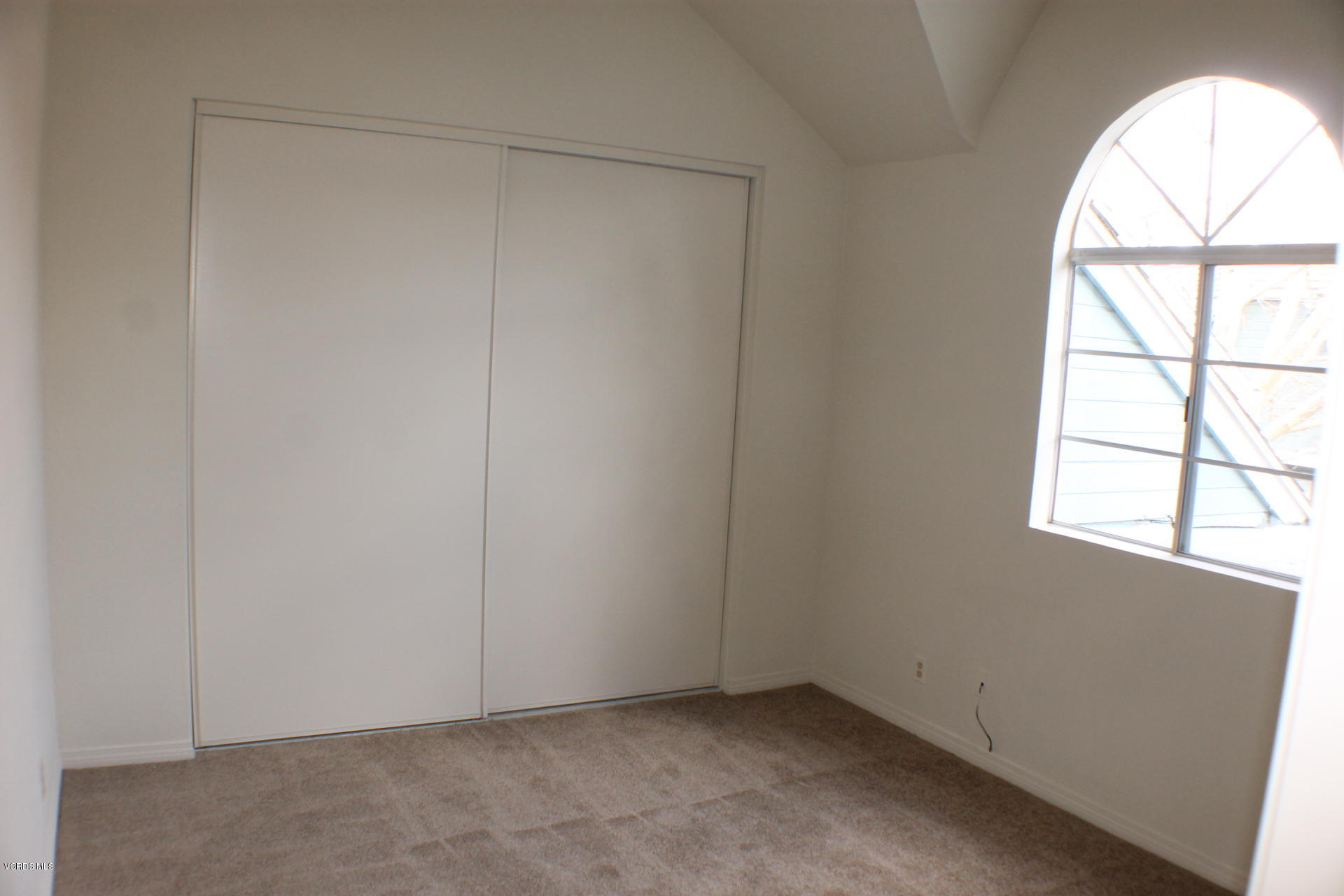 1878 Rory Lane, Unit 2 Simi Valley, CA 93063 - Photo 23 of 30 an empty room with a window