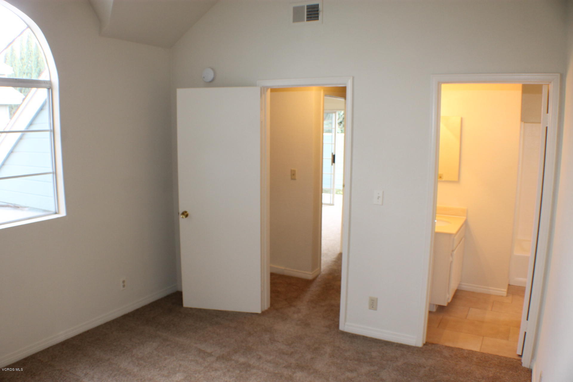 1878 Rory Lane, Unit 2 Simi Valley, CA 93063 - Photo 25 of 30 an empty room with windows