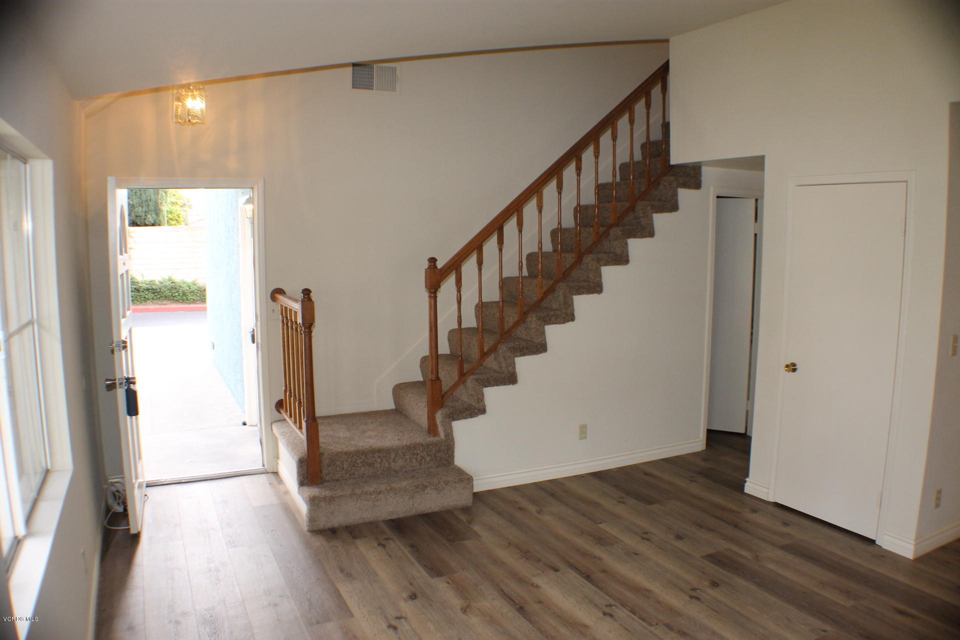 1878 Rory Lane, Unit 2 Simi Valley, CA 93063 - Photo 4 of 30 a view of entryway with wooden floor and stairs