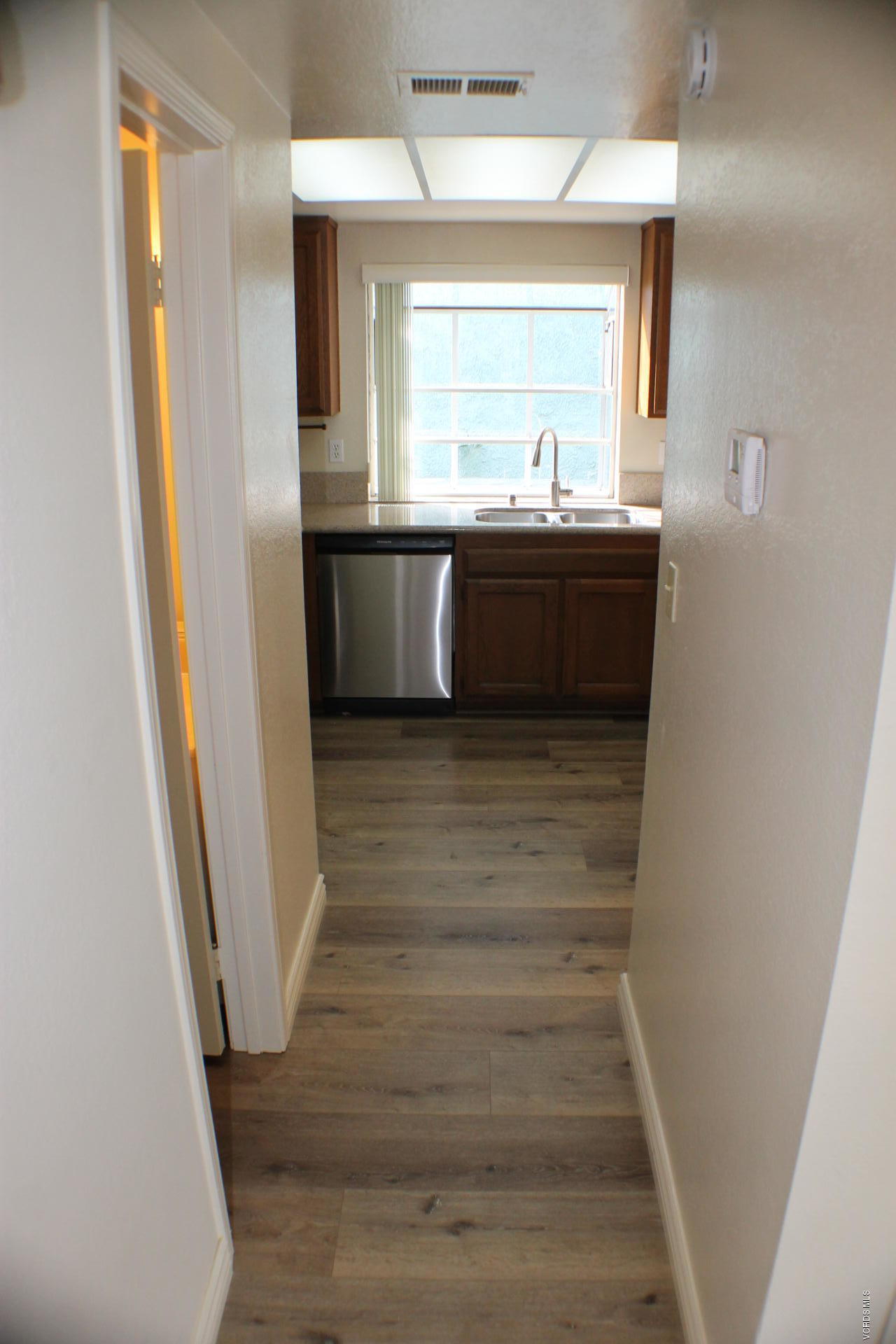 1878 Rory Lane, Unit 2 Simi Valley, CA 93063 - Photo 7 of 30 a view of bathroom with bathtub and wooden floor