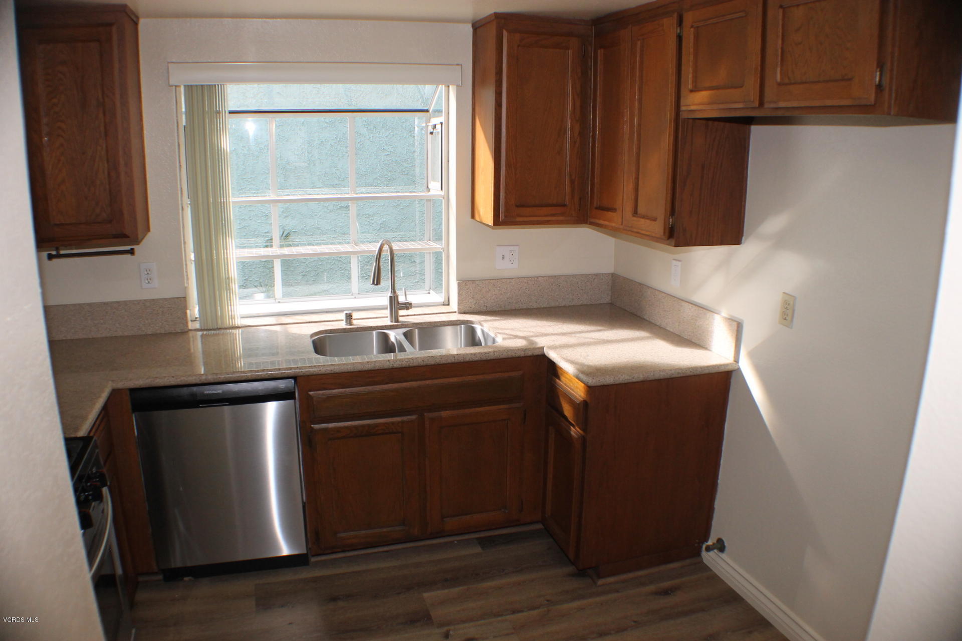 1878 Rory Lane, Unit 2 Simi Valley, CA 93063 - Photo 8 of 30 a kitchen with a sink and a window