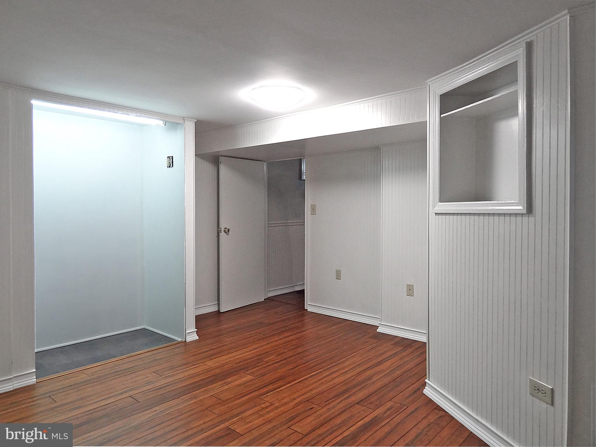 895 Woods Road Pasadena, MD 21122 - Photo 23 of 27 BAMBOO LOWER LEVEL FLOORS