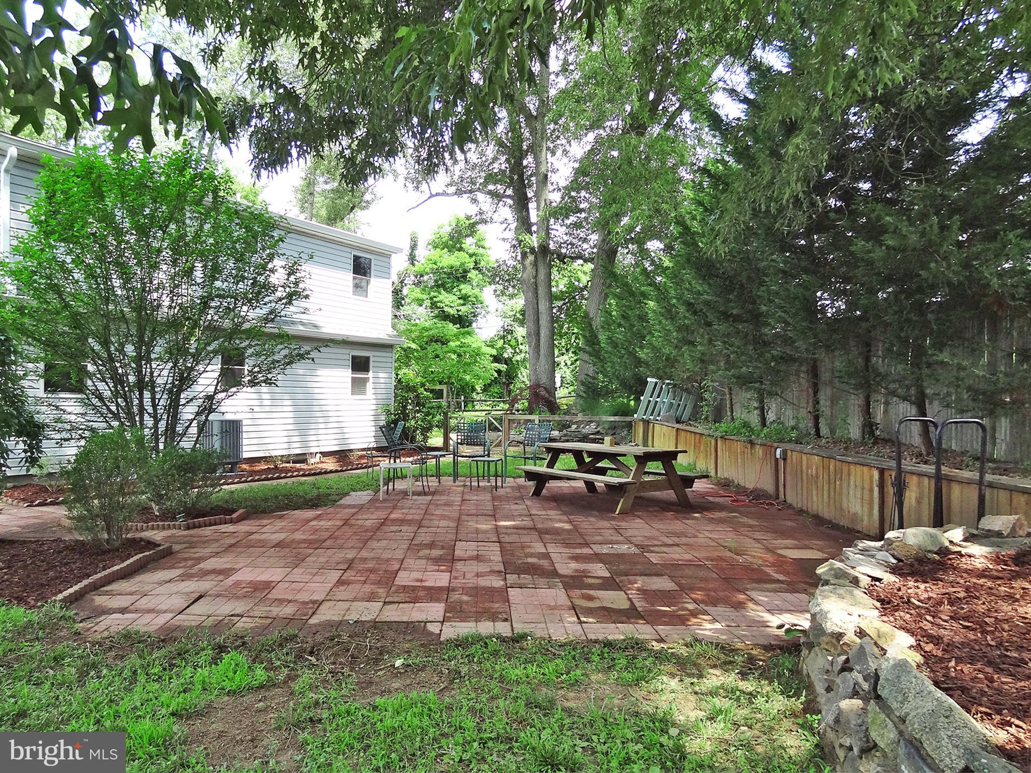 895 Woods Road Pasadena, MD 21122 - Photo 26 of 27 SIDE PATIO GREAT FOR ENTERTAINING