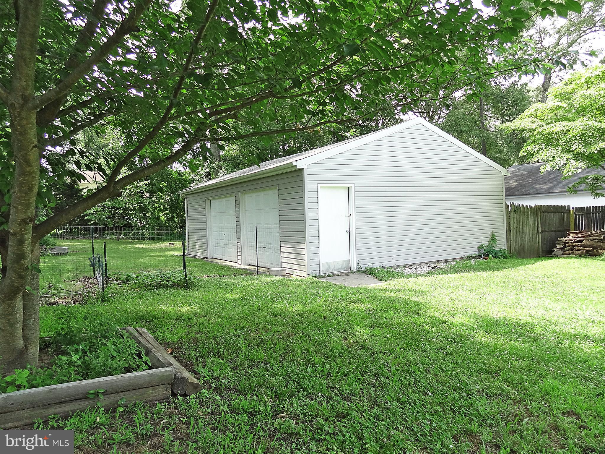 895 Woods Road Pasadena, MD 21122 - Photo 6 of 27 2+ CAR GARAGE WITH POWER - GREAT SHOP FOR HOBBIES