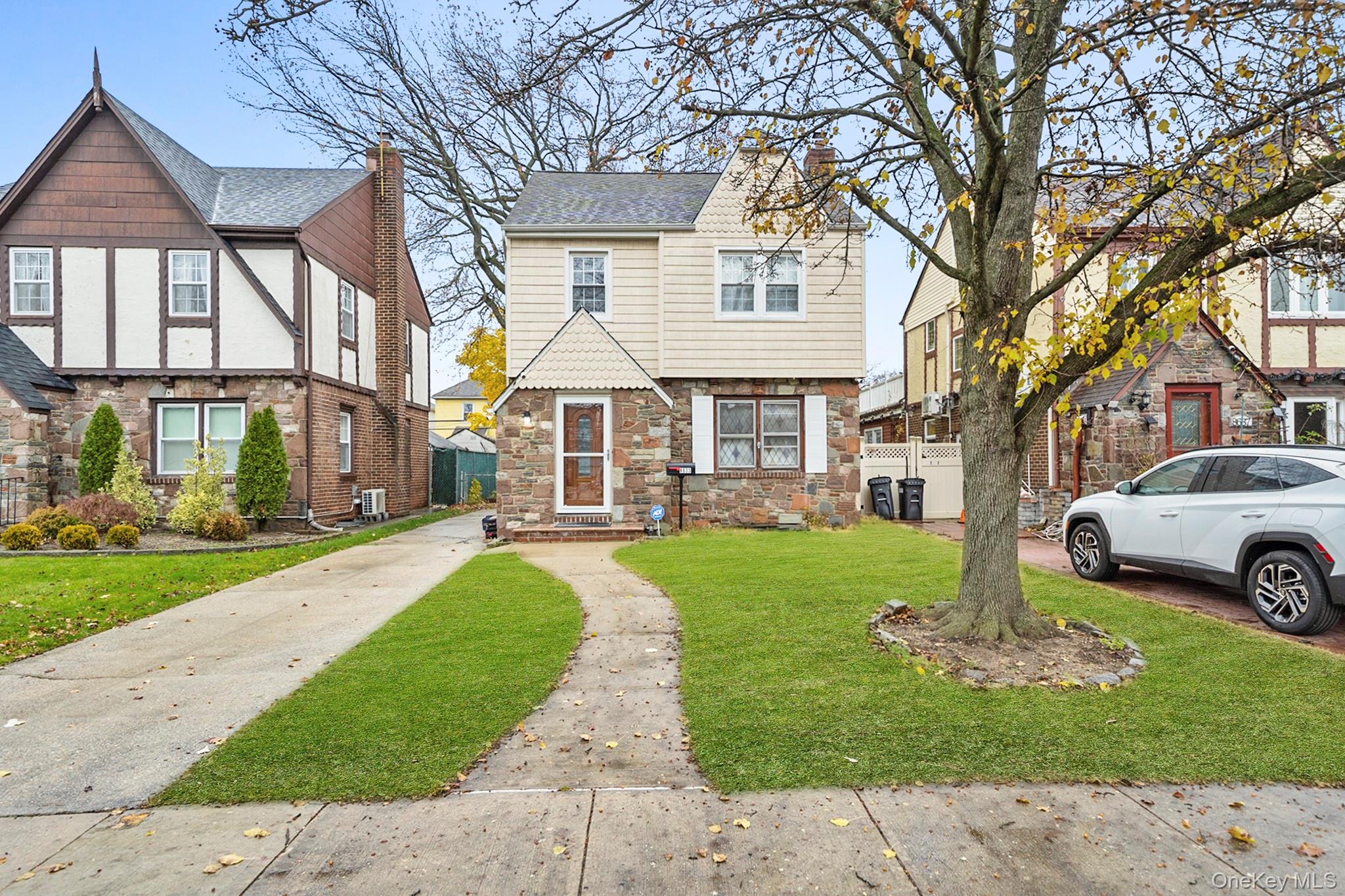 a house view with a garden space