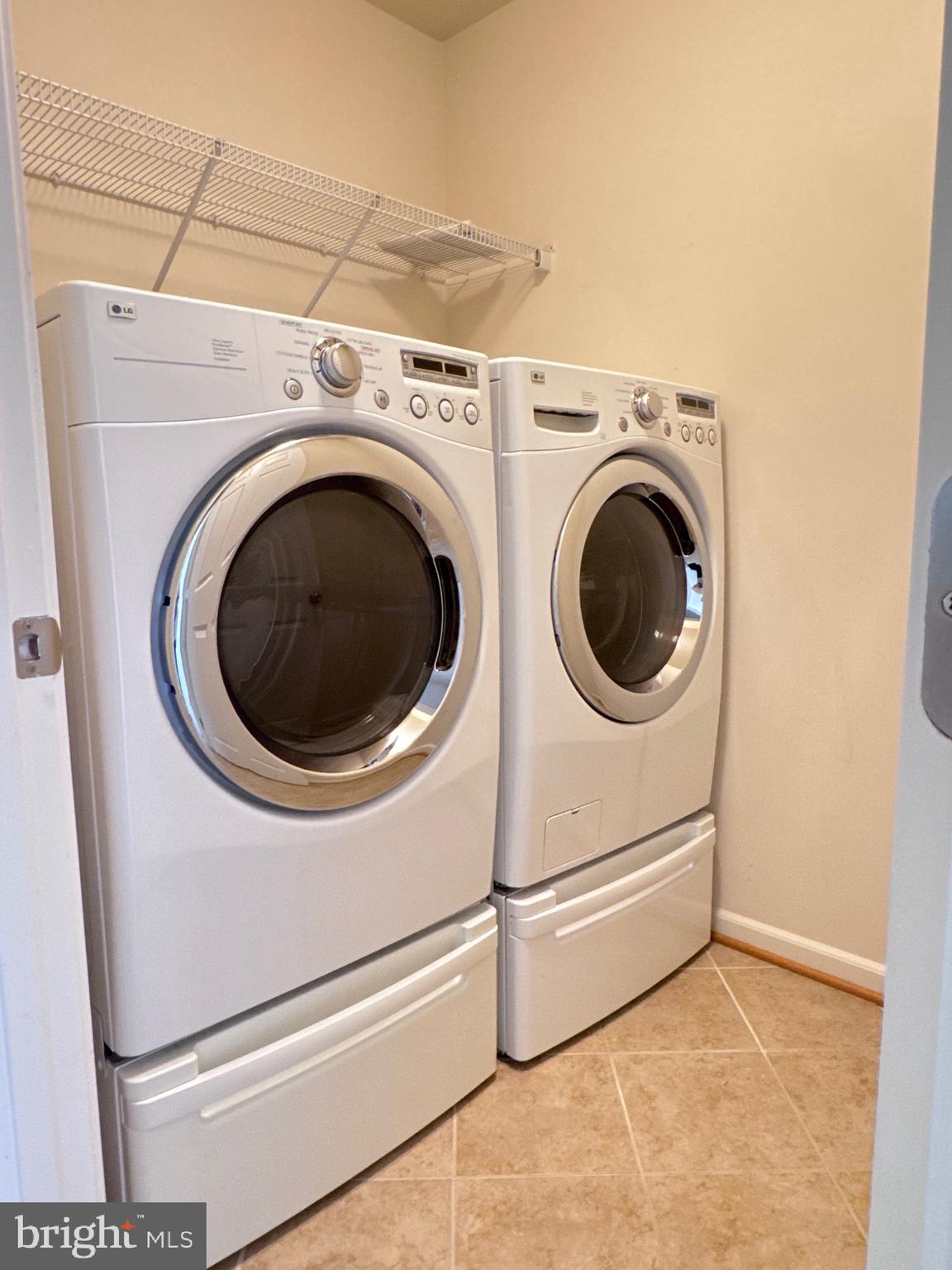309 Monroe Point Drive Colonial Beach, VA 22443 - Photo 12 of 52 a utility room with dryer and washer