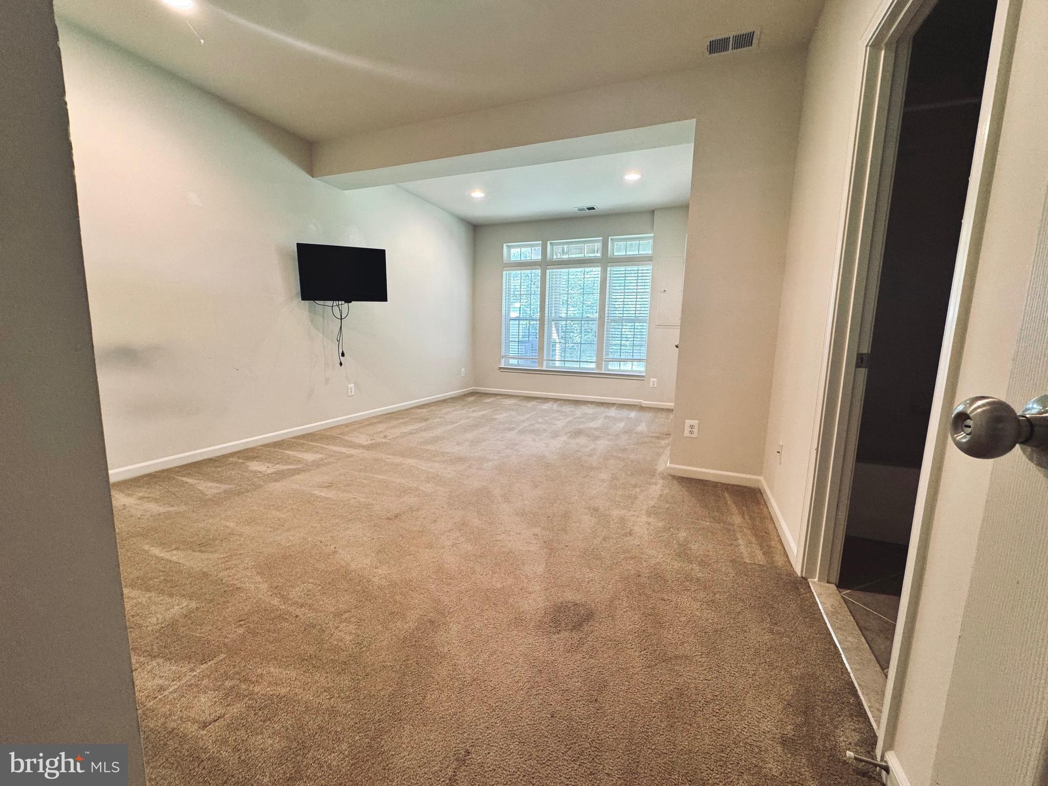 309 Monroe Point Drive Colonial Beach, VA 22443 - Photo 13 of 52 a view of an empty room with a window