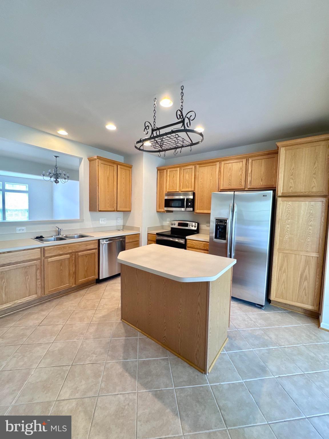 309 Monroe Point Drive Colonial Beach, VA 22443 - Photo 22 of 52 a view of kitchen with sink microwave and cabinets