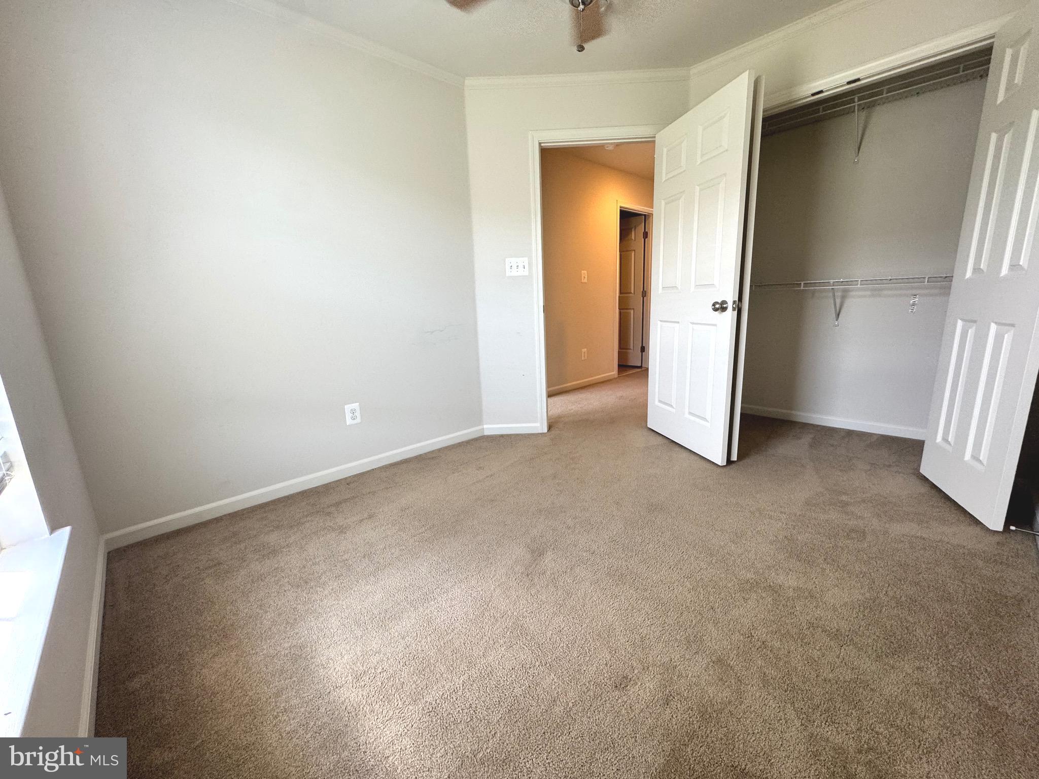 309 Monroe Point Drive Colonial Beach, VA 22443 - Photo 39 of 52 an empty room with windows
