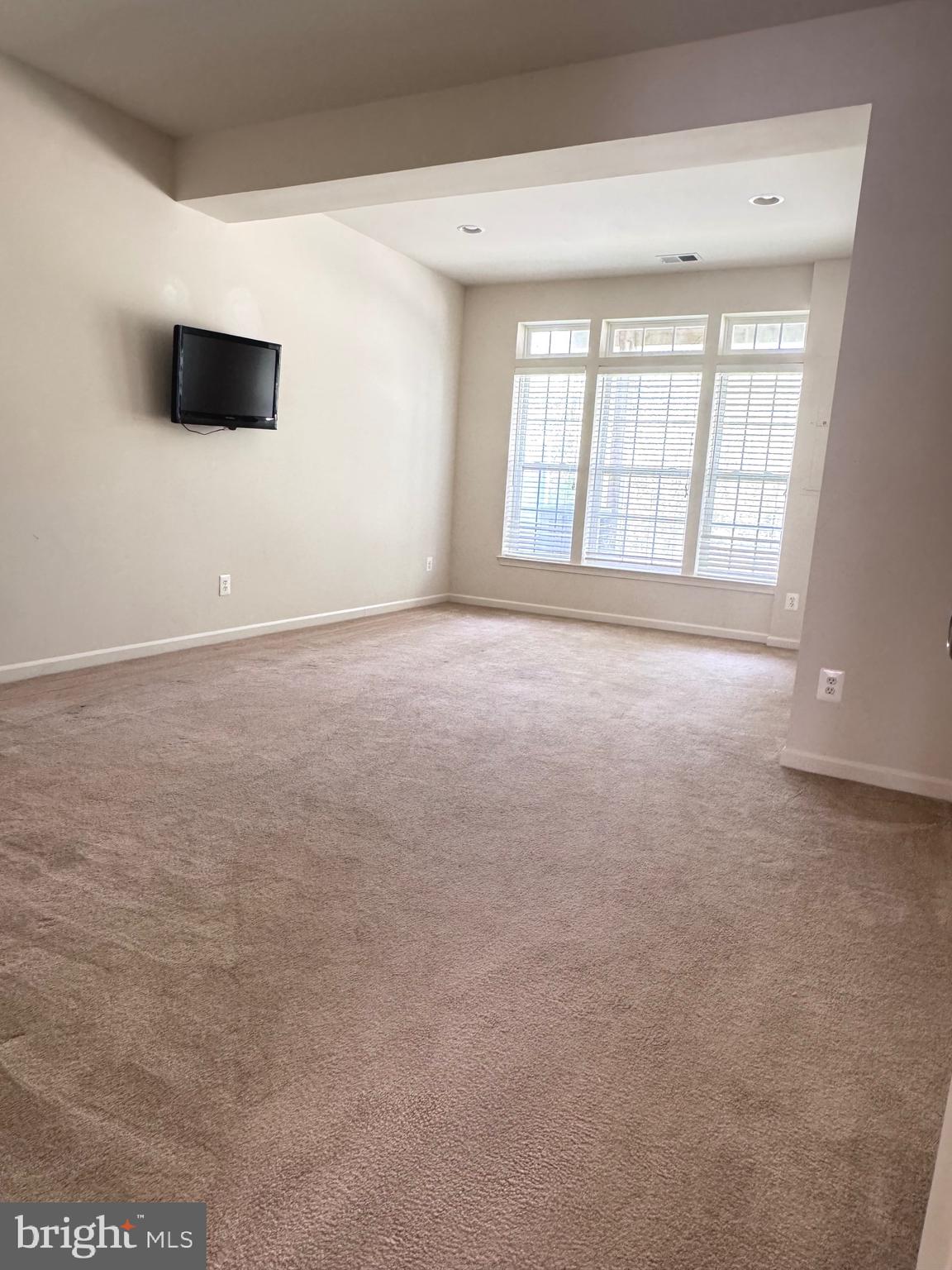 309 Monroe Point Drive Colonial Beach, VA 22443 - Photo 8 of 52 a view of an empty room with a window