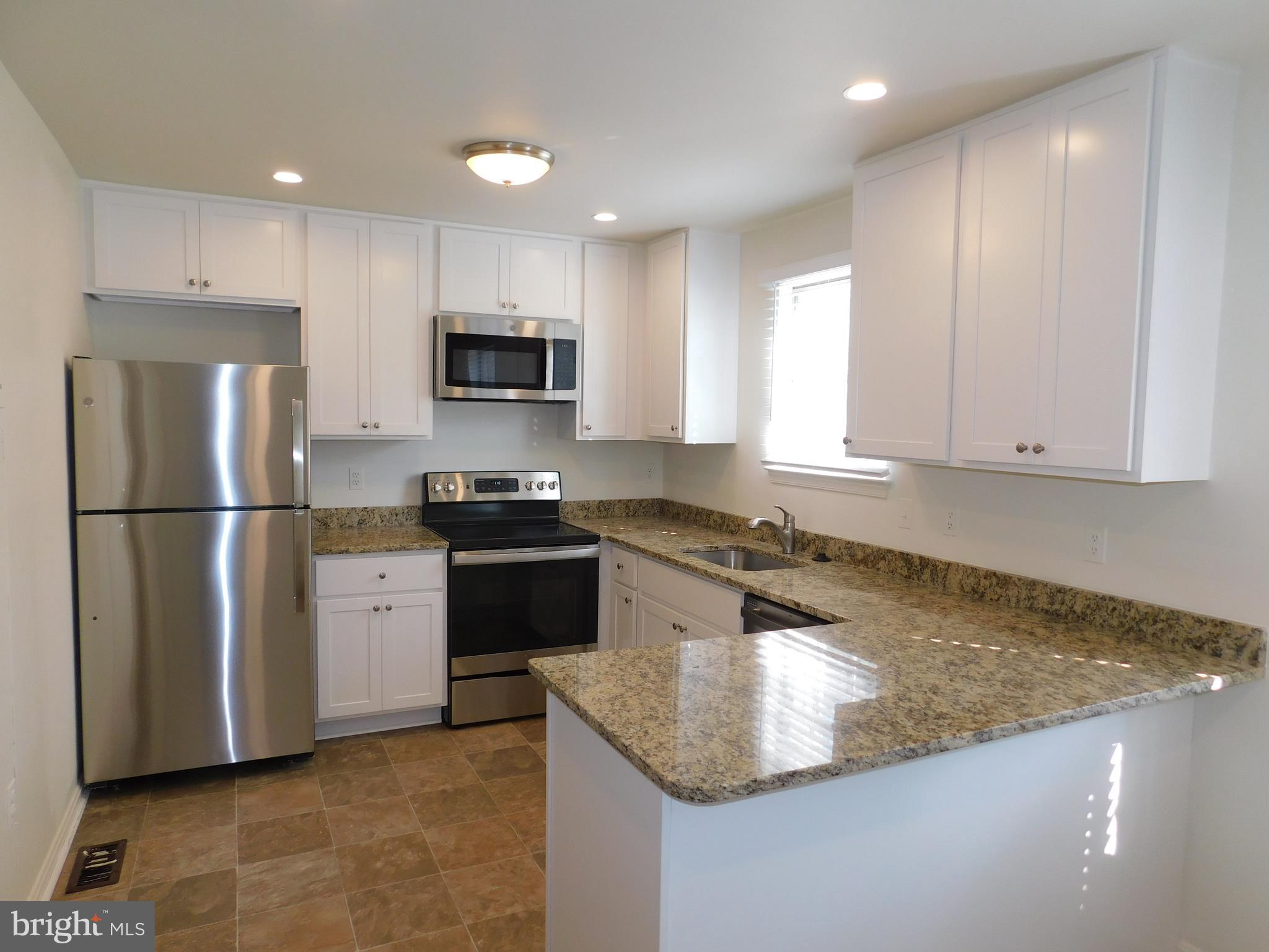 3835 Ferrara Drive Silver Spring, MD 20906 - Photo 3 of 53 Kitchen with Stainless Appliances, Recessed Lights