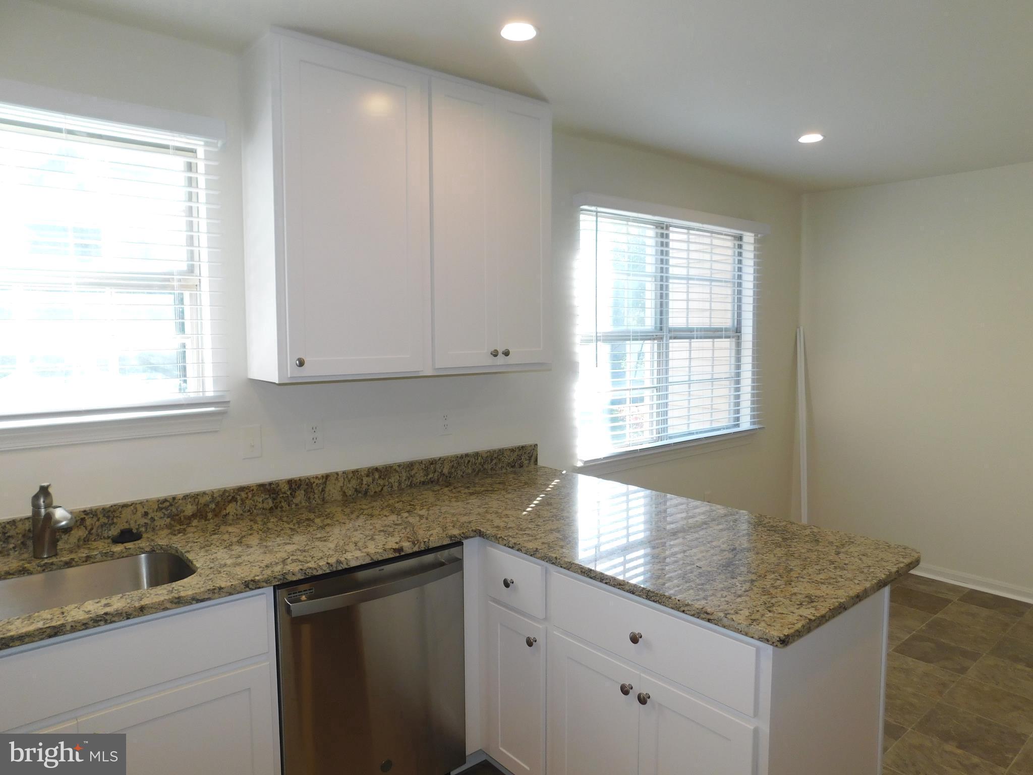 3835 Ferrara Drive Silver Spring, MD 20906 - Photo 5 of 53 Kitchen and adjacent Breakfast Area