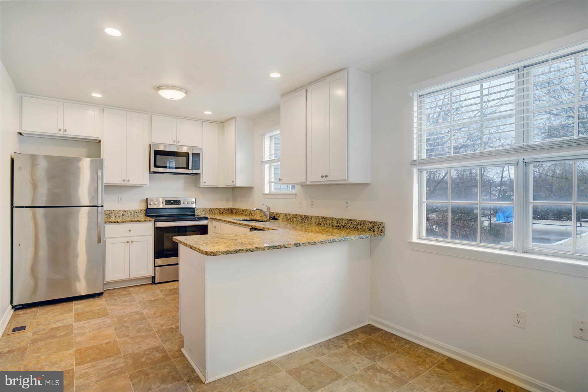 3835 Ferrara Drive Silver Spring, MD 20906 - Photo 6 of 53 View of Kitchen from Breakfast Area