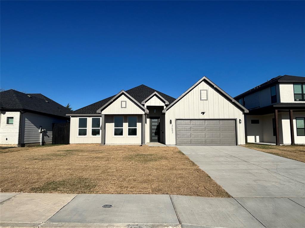 2403 Gooch Street Dallas, TX 75241 - Photo 2 of 3 a front view of a house with yard