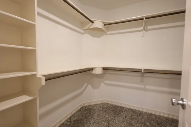 a view of small space with racks on the wall