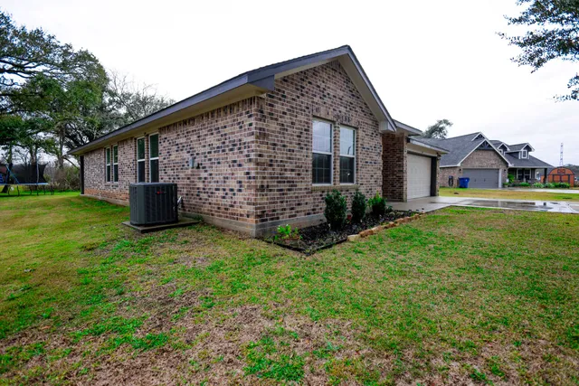 a front view of house with garden