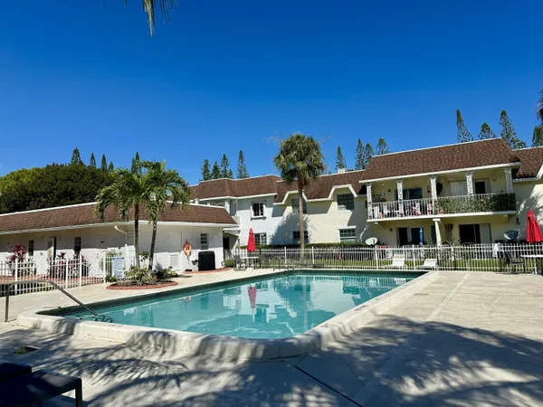 a view of a house with swimming pool