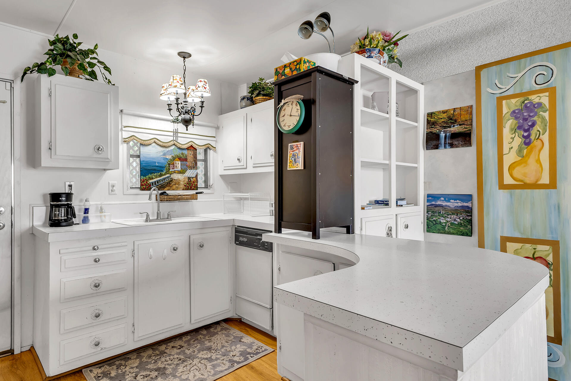 219 Stone Terrace Palm Springs, CA 92264 - Photo 11 of 41 a kitchen with a sink a stove and cabinets