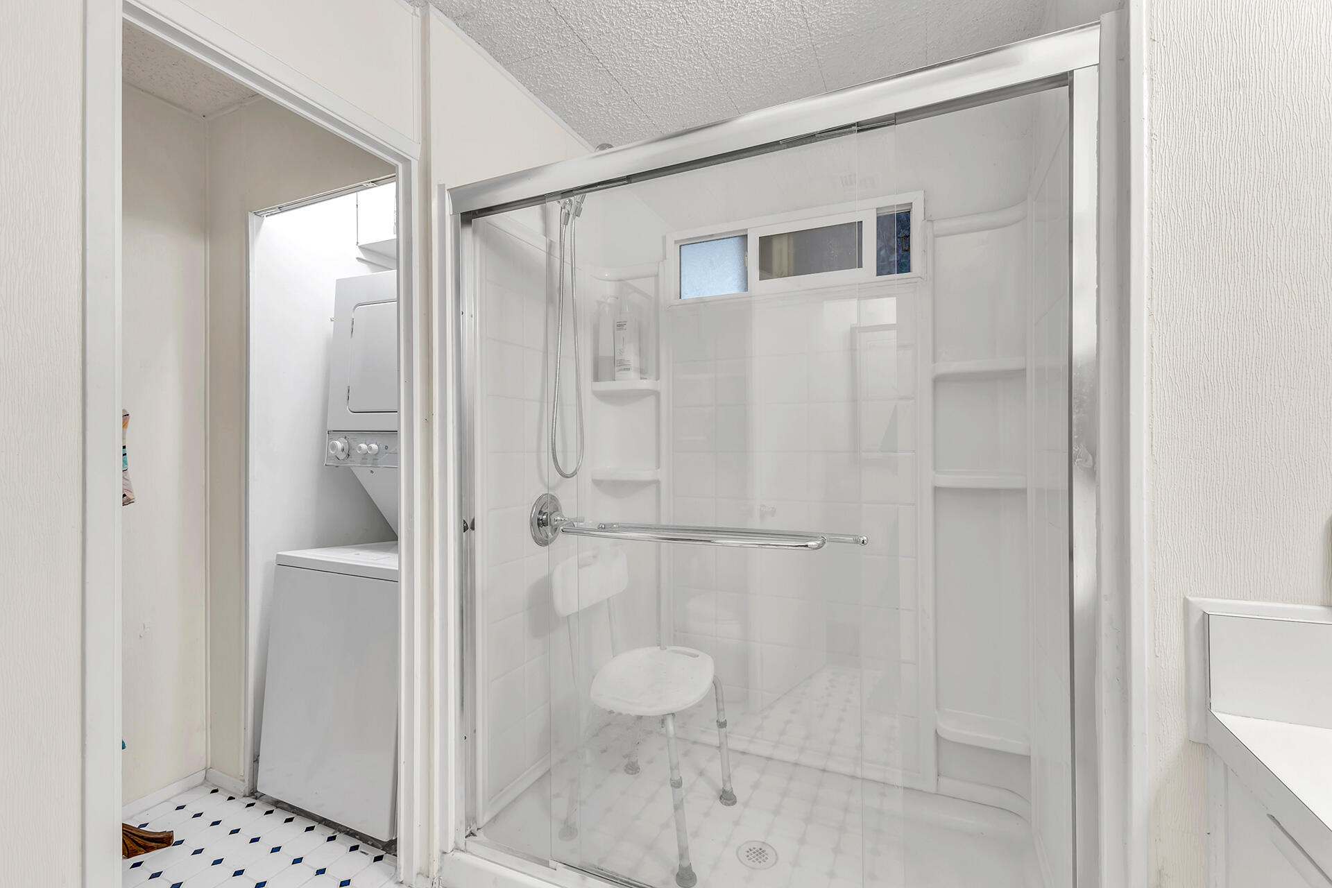 219 Stone Terrace Palm Springs, CA 92264 - Photo 12 of 41 a bathroom with a shower and toilet