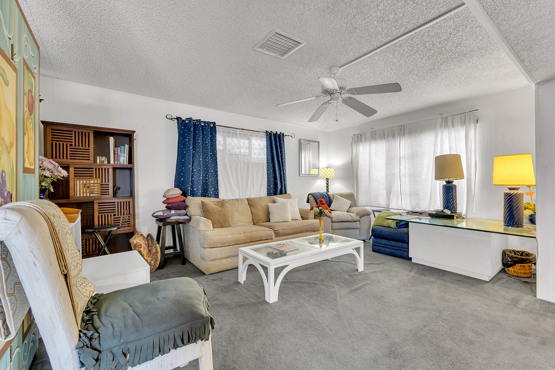 219 Stone Terrace Palm Springs, CA 92264 - Photo 4 of 41 a living room with furniture and a large window
