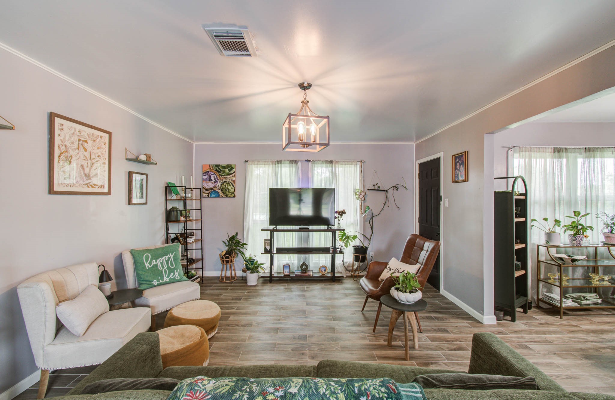 1327 Fallbrook Drive Houston, TX 77038 - Photo 7 of 34 a living room with furniture a dining table and a fireplace