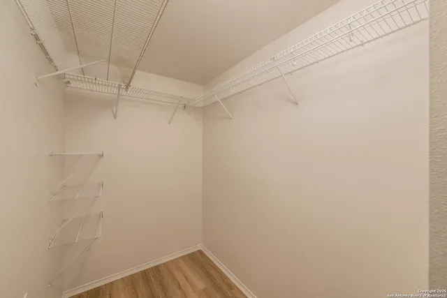 a view of a room with racks on the wall