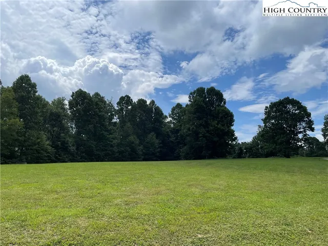 a view of a bench in a garden