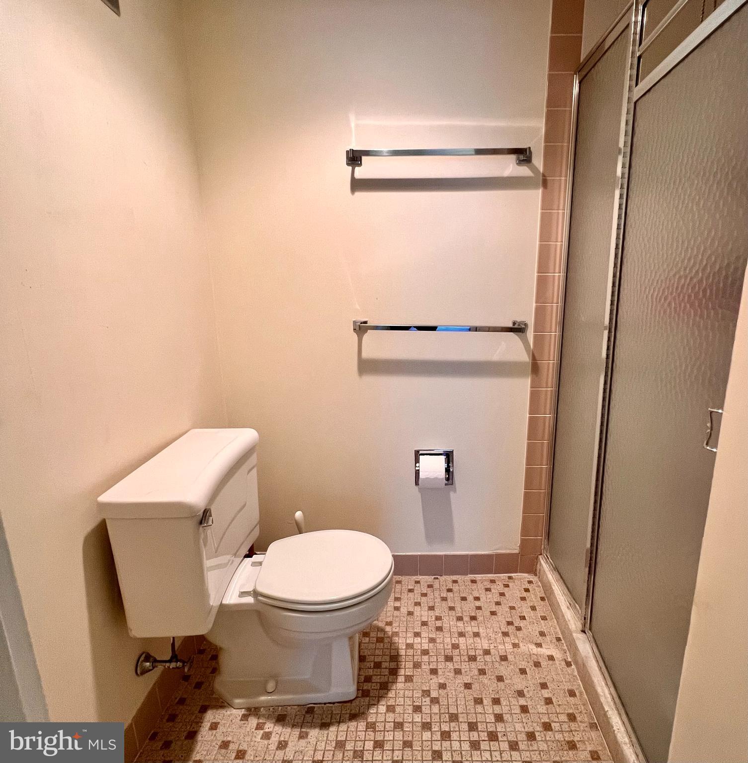100 West Avenue, Unit 418S Jenkintown, PA 19046 - Photo 13 of 18 a bathroom with a toilet and a shower