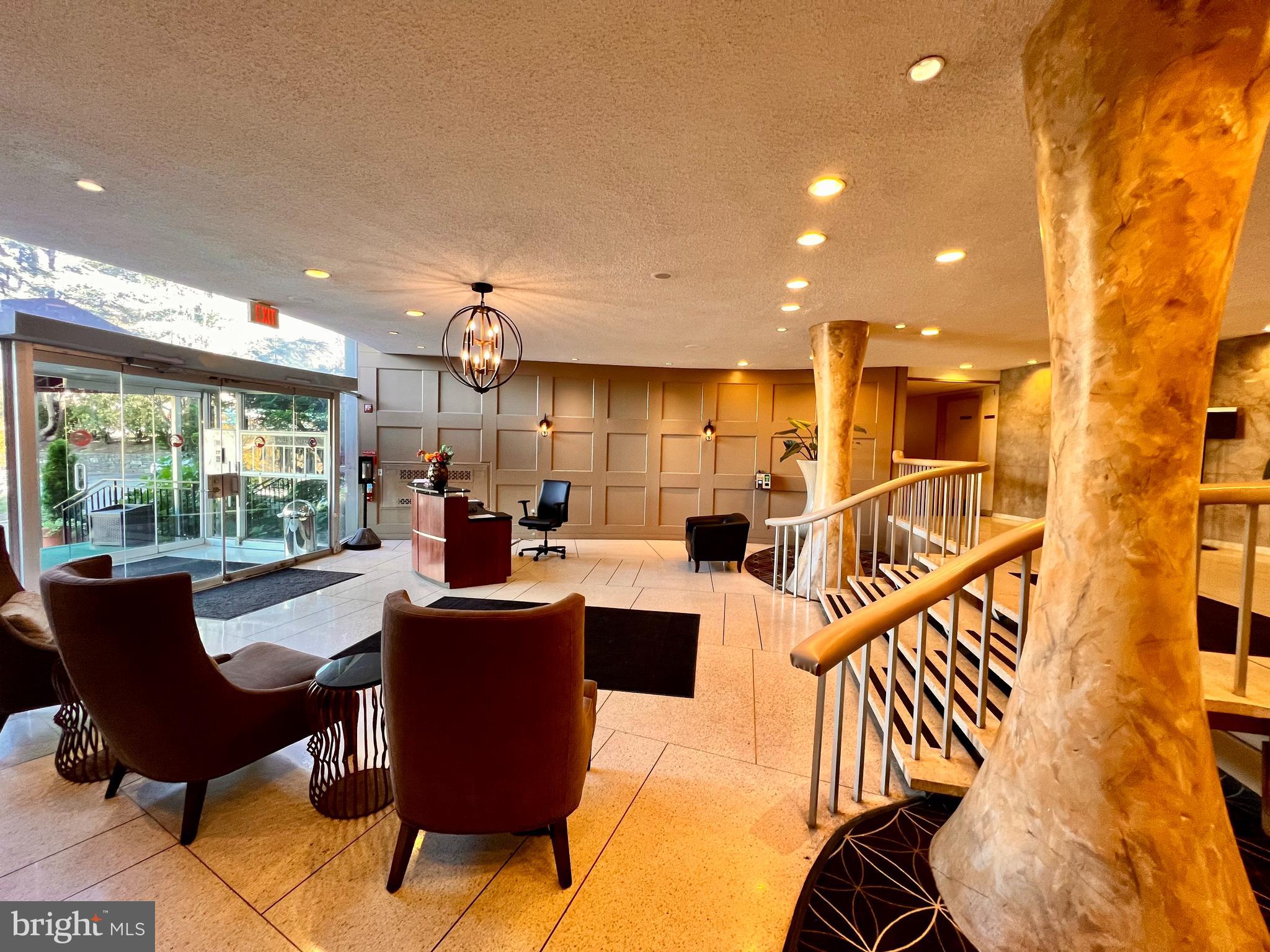 100 West Avenue, Unit 418S Jenkintown, PA 19046 - Photo 2 of 18 a dining room with furniture and a view of kitchen