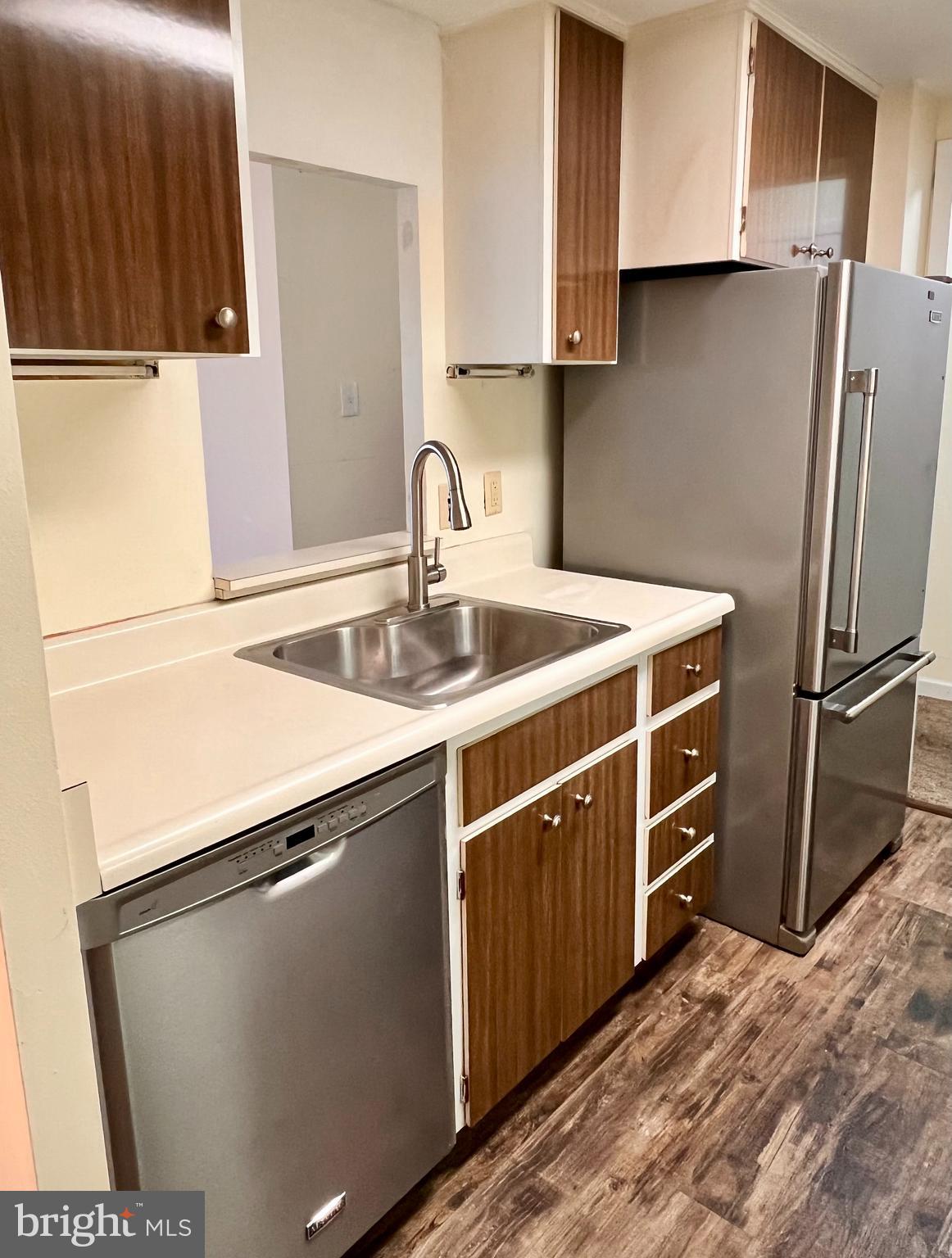 100 West Avenue, Unit 418S Jenkintown, PA 19046 - Photo 5 of 18 a kitchen with stainless steel appliances granite countertop a sink stove and refrigerator