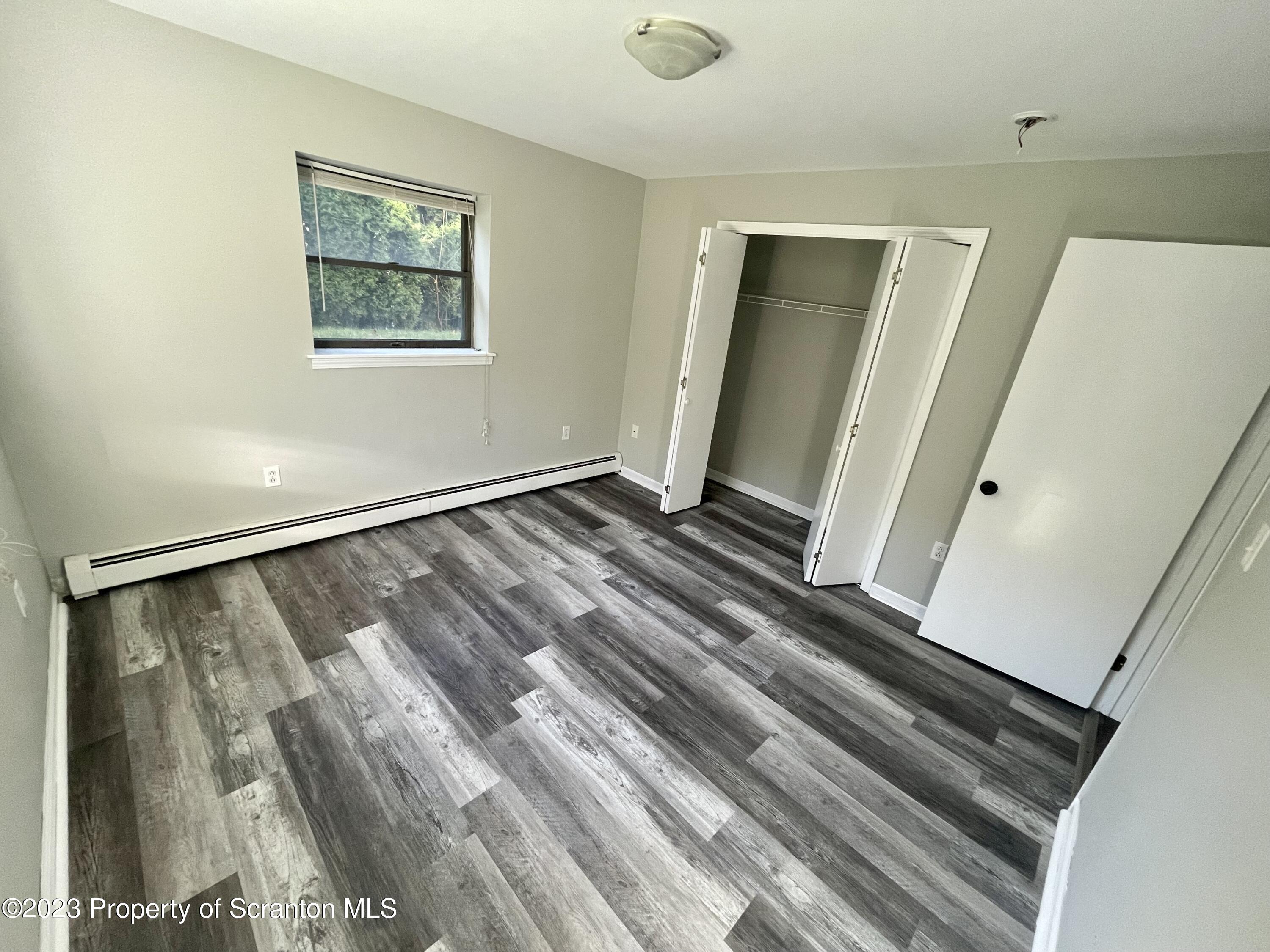 118 1/2 Frank Street, Unit B Dunmore, PA 18512 - Photo 11 of 15 a view of an empty room