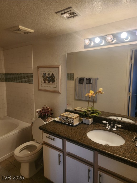 2300 East Silverado Ranch Boulevard, Unit 2158 Las Vegas, NV 89123 - Photo 12 of 19 Bathroom with a textured wall, a textured ceiling,