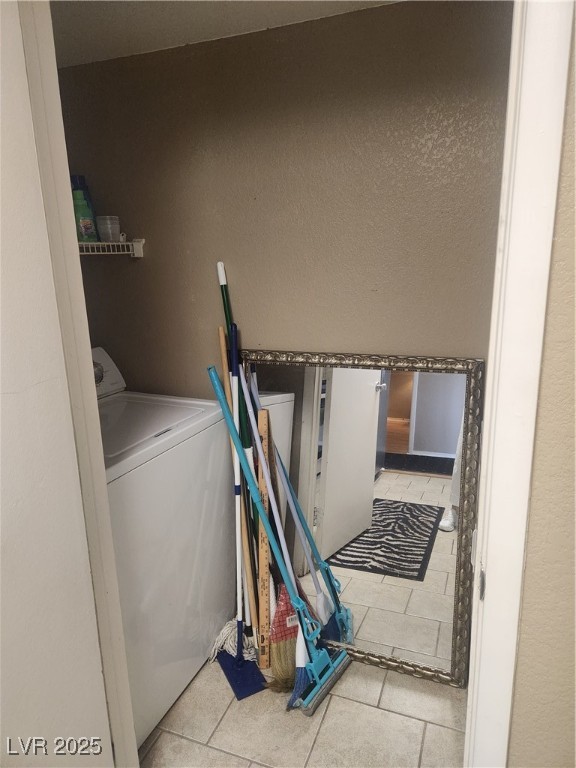 2300 East Silverado Ranch Boulevard, Unit 2158 Las Vegas, NV 89123 - Photo 16 of 19 Laundry area featuring included washer / dryer, ti