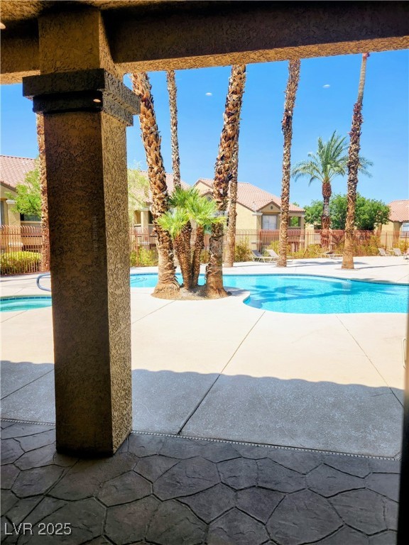 2300 East Silverado Ranch Boulevard, Unit 2158 Las Vegas, NV 89123 - Photo 19 of 19 Community pool and spa featuring a patio area