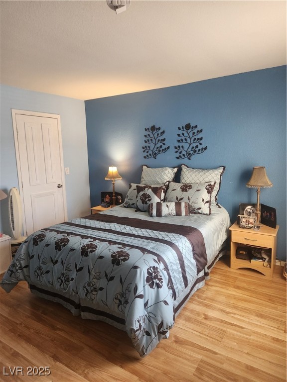 2300 East Silverado Ranch Boulevard, Unit 2158 Las Vegas, NV 89123 - Photo 10 of 19 Primary bedroom is one of 2 Bedroom featuring wood